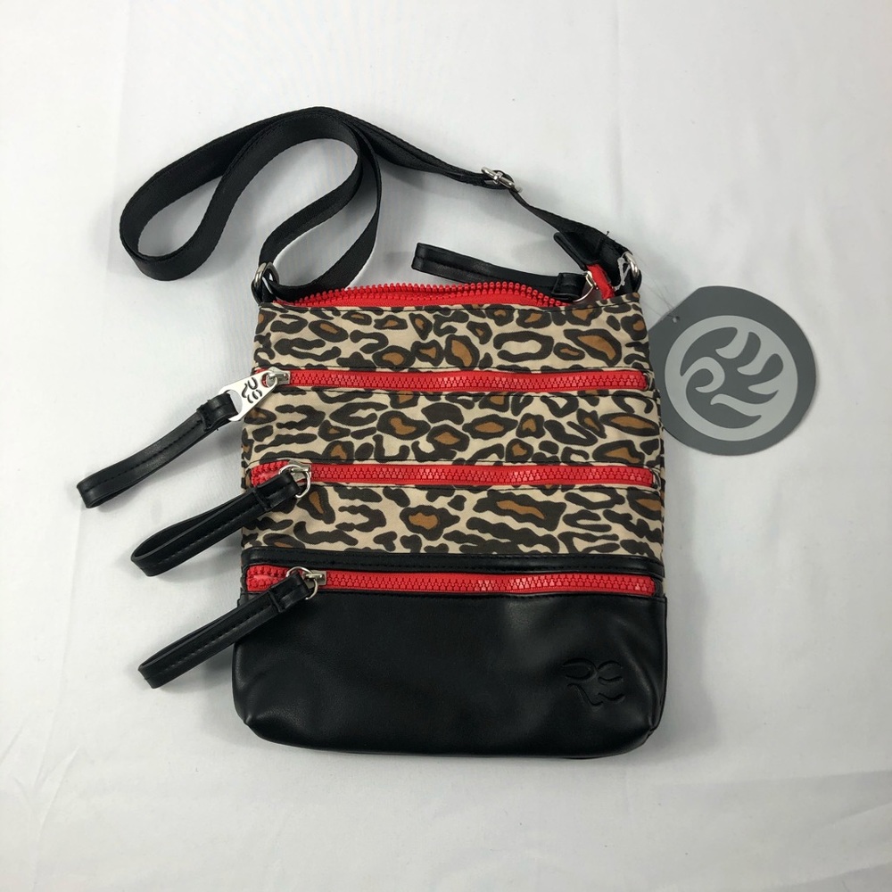 Rare Earth Women’s  bag Black with cheetah print and read zippers in front. NWT